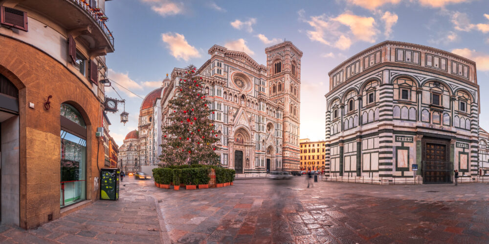 Florence,  Italy during Christmas season with the Duomo at dawn.