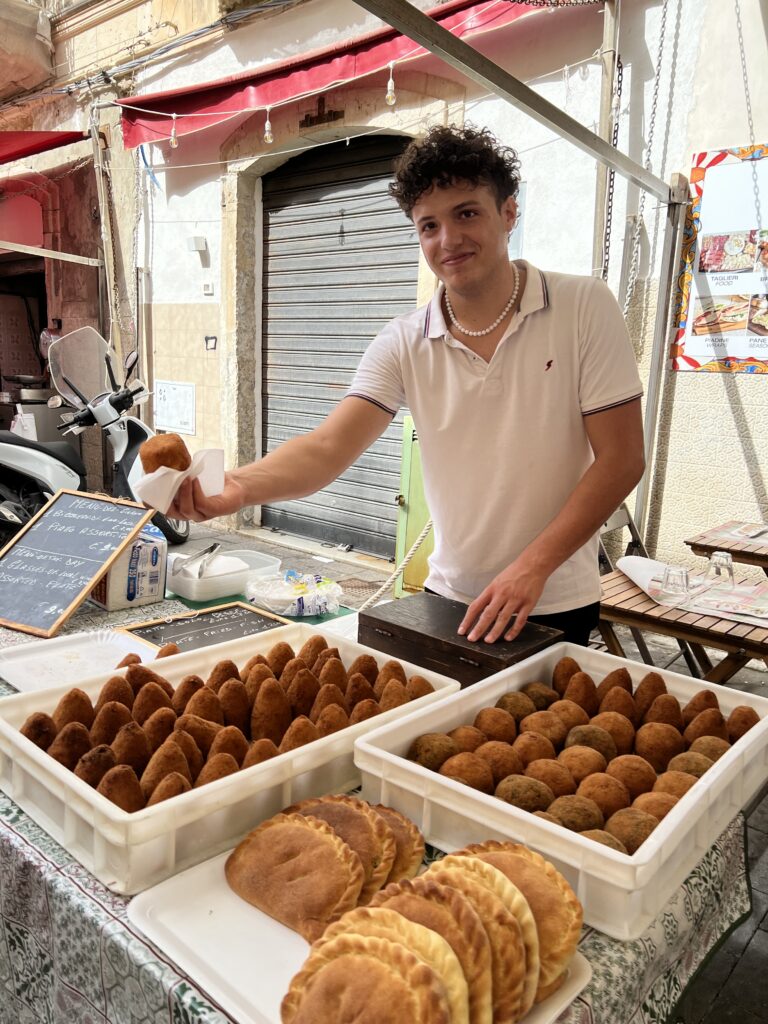 Arancini in Eastern Sicily market of Ortigia.