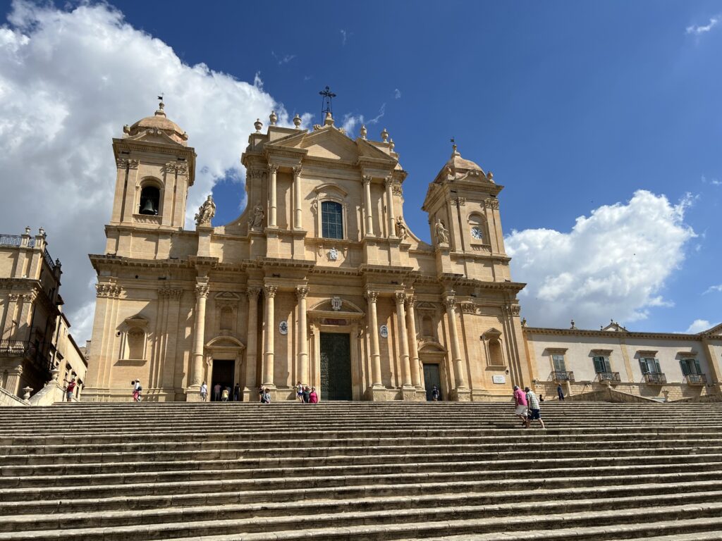 the Noto duomo in Noto Sicily with steps leading. up to the entrance.