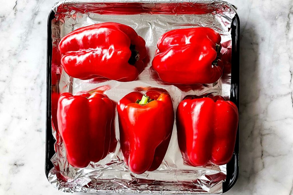 red bell peppers on baking sheet. 