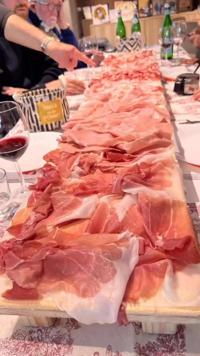 BOLOGNA AND ITS NEIGHBORS

There are only a few chances left to travel with me to Italy in 2026. My “Bologna and its Neighbors” tour has just five spots left! And it’s one of my most delicious destinations! 

Picture This: 

The scent of simmering ragù drifting through medieval streets. Fresh pasta rolled by hand exactly as it has been for generations. Parmigiano Reggiano aging quietly in enormous warehouses. Family-run producers preserving traditions the world is slowly forgetting.
This October, I invite you to experience it all with me on an intimate culinary journey through Bologna and the Emilia-Romagna region — the gastronomic heart of Italy. 🍷🍝

Together, we’ll:
✨ Visit artisan Parmigiano Reggiano producers
✨ Taste authentic aged balsamic vinegar in Modena
✨ Visit a family-run prosciutto producer
✨ Learn to make fresh pasta by hand
✨ Wander Bologna’s vibrant markets and hidden alleyways
✨ Share unforgettable meals and regional wines
✨ Slow down and truly savor Italy

Bologna will be our home for the week as we immerse ourselves in the food, culture, traditions, and warmth of this incredible region — not as tourists, but as welcomed guests. Stay in a beautiful 4* hotel steps from Piazza Maggiore. Enjoy one of the most delicious breakfast stations before setting out for the day! 

What makes these journeys so special isn’t just the food. It’s the people. The stories. The connections made around long tables.
As a native Italian, my goal is not simply to show you Italy — it’s to help you feel connected to it.

This experience is intentionally small and intimate, so every moment feels personal, relaxed, and authentic.

If you’ve been dreaming of Italy… this may be your sign. ❤️